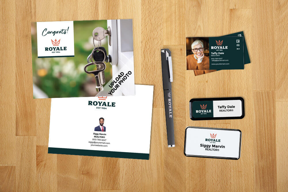 Assorted personalized real estate marketing materials laid out on a wooden surface, featuring the Royale real estate brand. The collection includes a key-shaped door hanger with a 'Congrats!' message, business cards, and name badges for realtors Taffy Dale and Siggy Marvin, alongside a branded pen. The materials showcase professional design with clear branding, perfect for enhancing realtor visibility and client engagement.