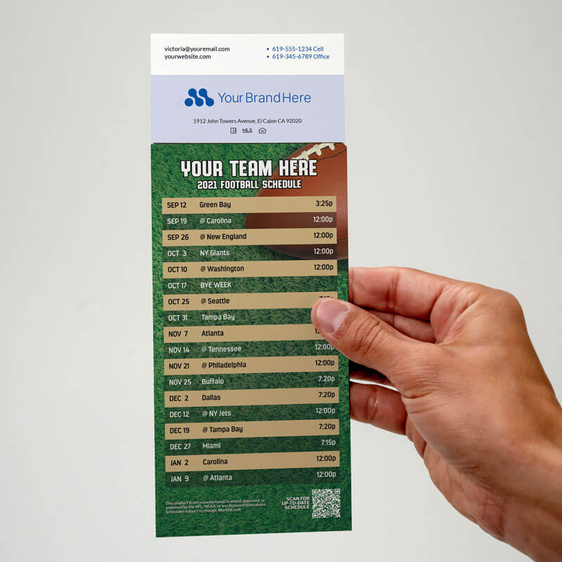 Your business card applied with adhesive to the top of a football schedule